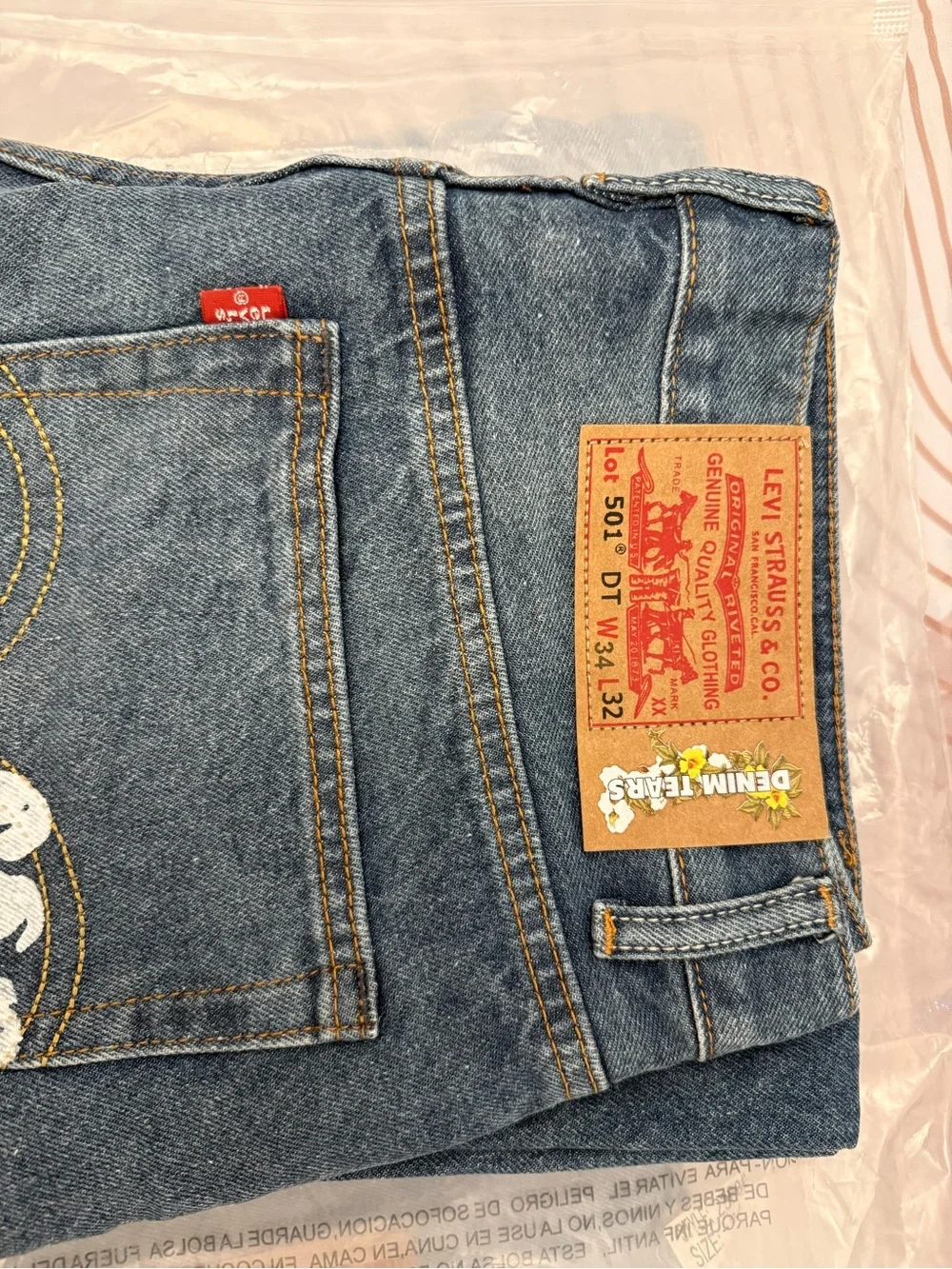 Women’s Blue Denim Jeans with White Floral Print